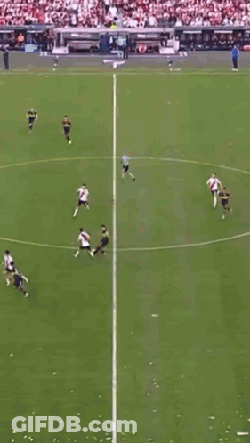 Soccer Player Number 16 Kicking Ball GIF