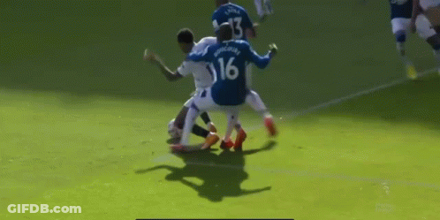 Soccer Player Number 16 Tackled GIF