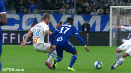 Soccer Player Number 17 Kicks Ball GIF