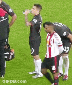 Soccer Player Number 18 Drinking From Bottle GIF