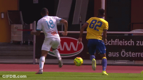 Soccer Player Number 18 Kicking Ball GIF