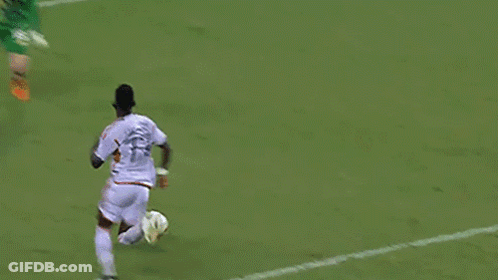Soccer Player Number 18 Kicking Ball GIF