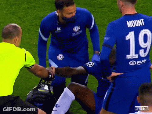 Soccer Player Number 19 Helped Off Field GIF