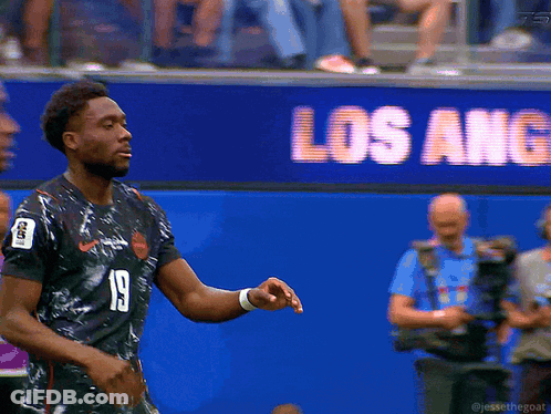 Soccer Player Number 19 In Front Of Los Angeles Banner GIF