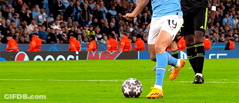 Soccer Player Number 19 Kicks Ball GIF