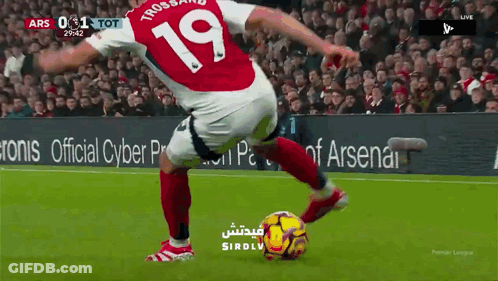 Soccer Player Number 19 Kicks Ball GIF