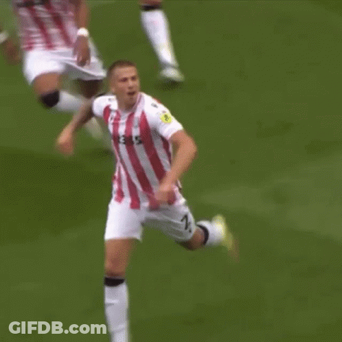 Soccer Player Number 2 Tackled GIF