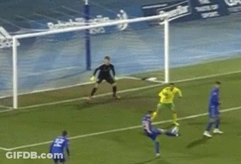 Soccer Player Number 21 Kicking Ball GIF