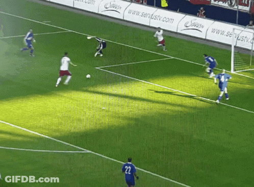 Soccer Player Number 22 Watching Ball GIF