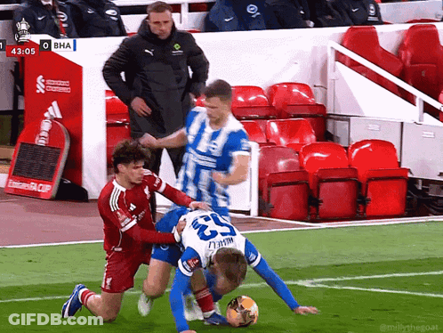 Soccer Player Number 23 Being Tackled GIF
