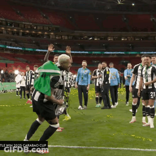Soccer Player Number 23 Holding Trophy GIF