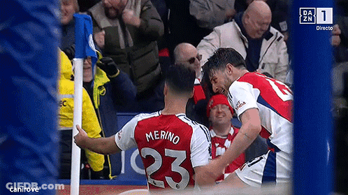 Soccer Player Number 23 Hugged By Another GIF
