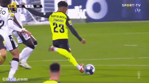 Soccer Player Number 23 Kicking Ball GIF