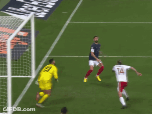 Soccer Player Number 23 Leaping Into Goal GIF