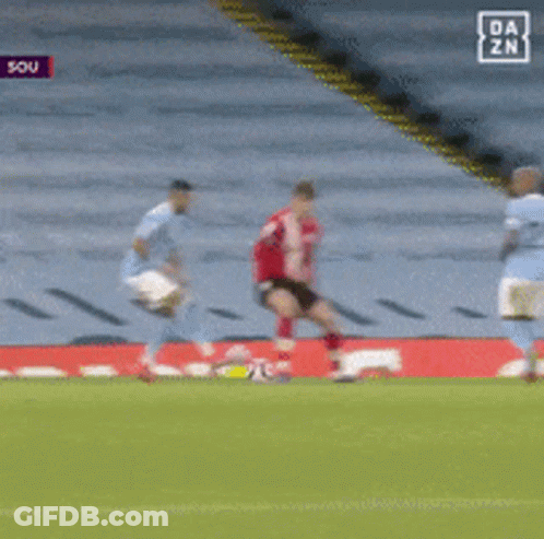 Soccer Player Number 26 Kicking Ball GIF