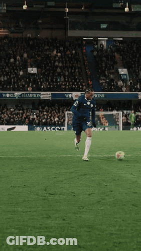 Soccer Player Number 26 Kicks Ball GIF