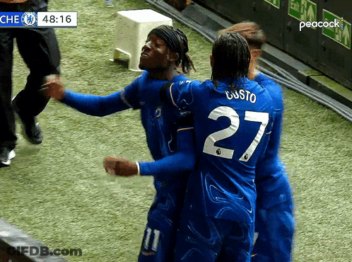 Soccer Player Number 27 Hugging Another Player GIF