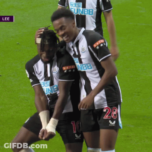 Soccer Player Number 28 Hugging Another Player GIF