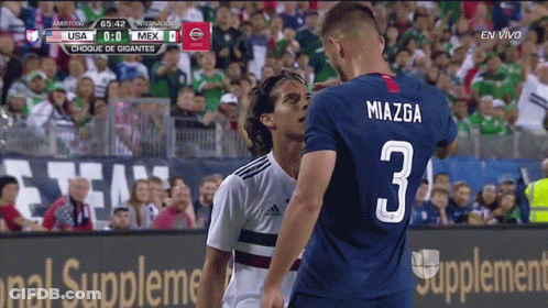 Soccer Player Number 3 Standing Next To Player GIF