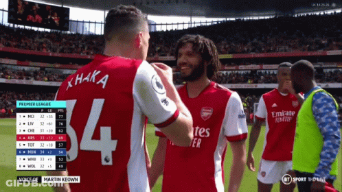 Soccer Player Number 4 Jersey Shakes Hands GIF
