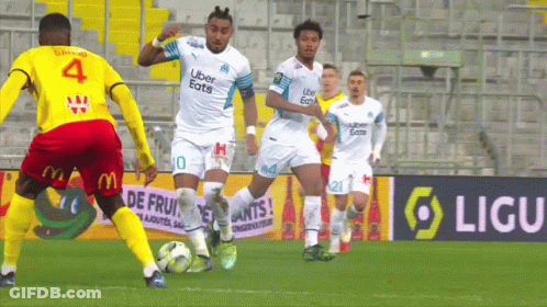 Soccer Player Number 4 Kicking Ball GIF
