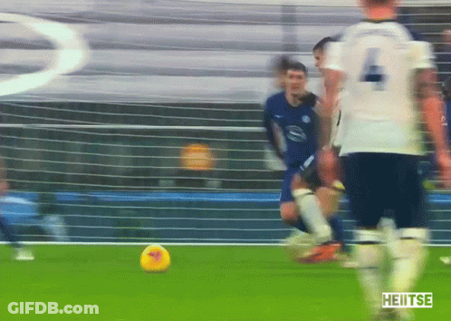 Soccer Player Number 4 Kicking Ball GIF