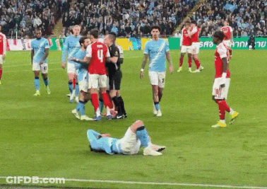 Soccer Player Number 4 Lying On Ground GIF