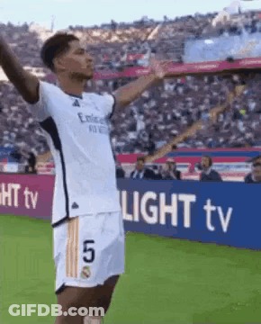 Soccer Player Number 5 Arms In Air GIF