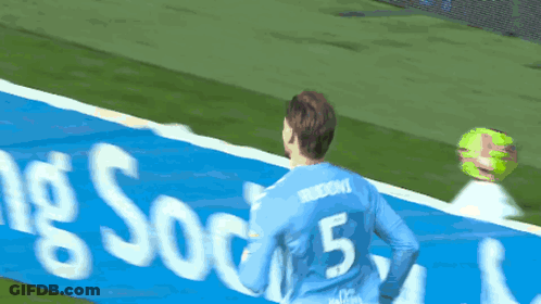 Soccer Player Number 5 Hugging Another Player GIF