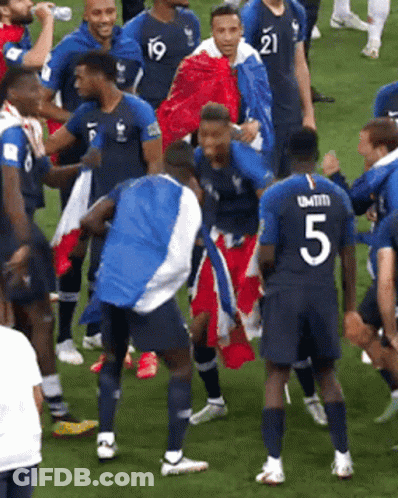 Soccer Player Number 5 Surrounded By Players GIF