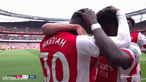 Soccer Player Number 50 Hugging Teammate GIF