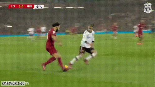 Soccer Player Number 6 Kicks Ball GIF