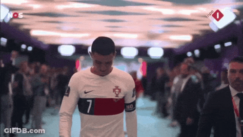 Soccer Player Number 7 Covering Face GIF