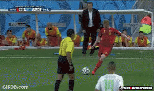 Soccer Player Number 7 Kicking Soccer Ball GIF