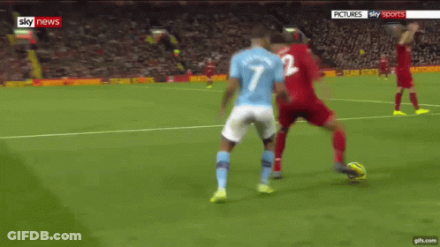 Soccer Player Number 7 Standing Next To Another Player GIF