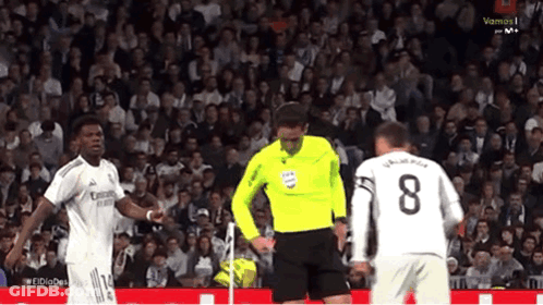 Soccer Player Number 8 In Front Of Referee GIF