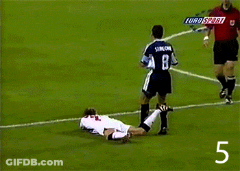 Soccer Player Number 8 Laying On Field GIF