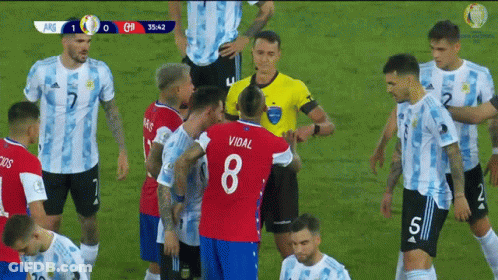 Soccer Player Number 8 Surrounded By Players GIF
