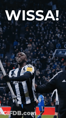 Soccer Player Number 9 Holding Flag GIF
