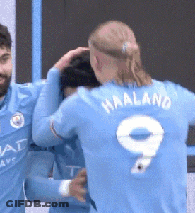 Soccer Player Number 9 Hugging Another Player GIF