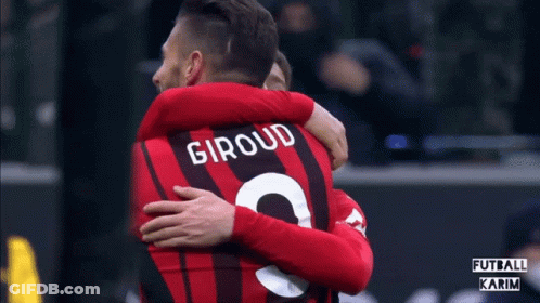 Soccer Player Number 9 Hugging Another Player GIF