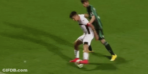 Soccer Player Number 9 Kicking Ball GIF