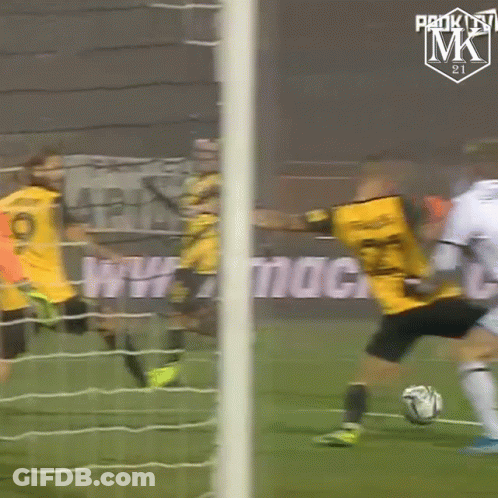 Soccer Player Number 9 Kicking Ball GIF