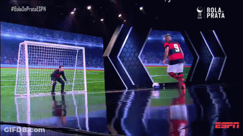 Soccer Player Number 9 Kicking Soccer Ball GIF