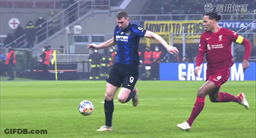 Soccer Player Number 9 Kicks Ball GIF