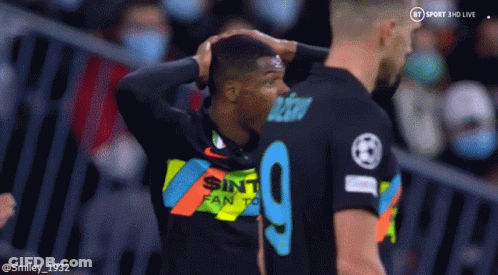 Soccer Player Number 9 Next To Another Player GIF
