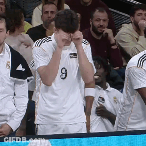 Soccer Player Number 9 Wiping Eyes GIF