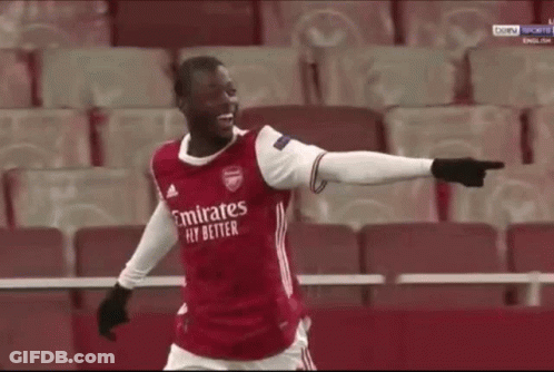 Soccer Player Pointing At Camera In Red Emirates Fly Better Shirt GIF