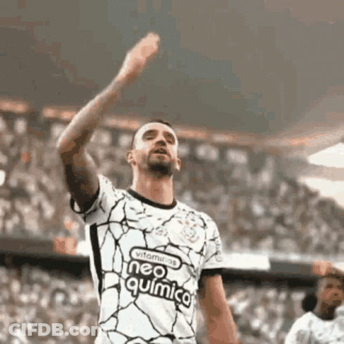 Soccer Player Raising Hand In Neo Química Jersey GIF