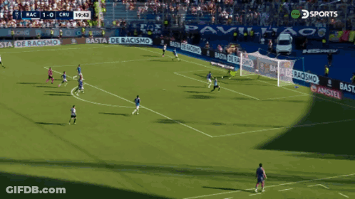 Soccer Player Running In Front Of Amstel Ad GIF